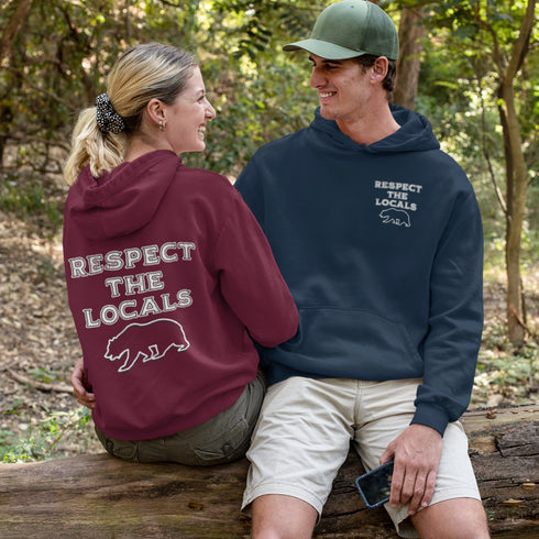Introducing our rugged and stylish camping hoodie, featuring an image of a bear and the empowering message "Respect The Locals."